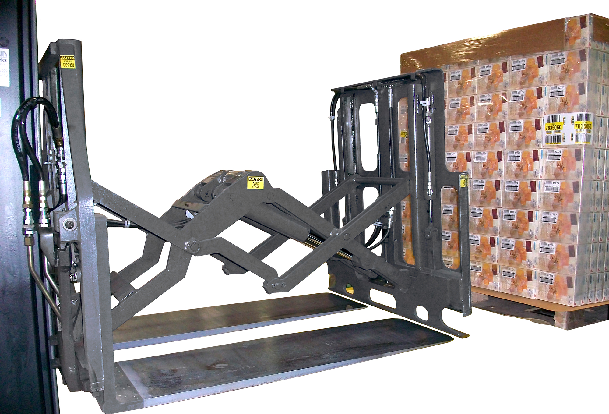 Forklift with a push-pull attachment handling a paper slip sheet